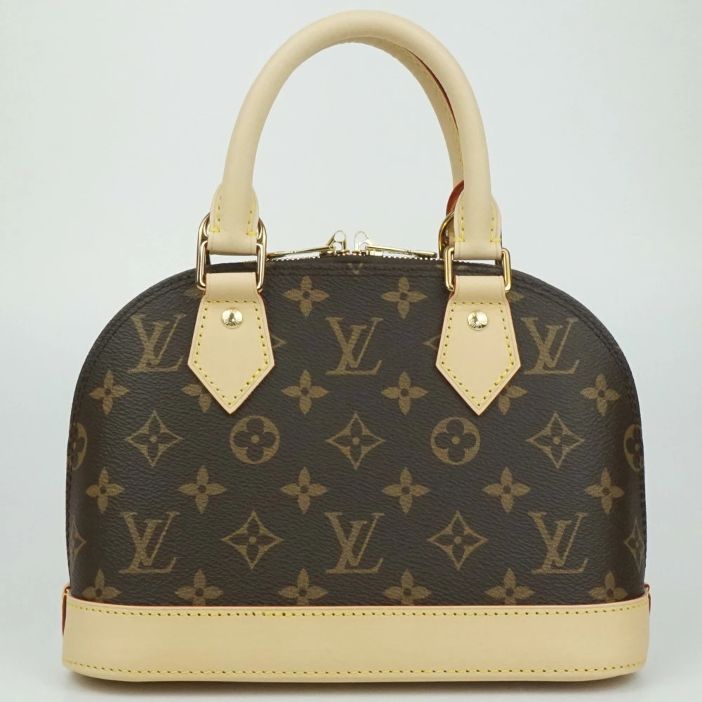 LOUIS VUITTON Alma Monogram Canvas Brown Handbag